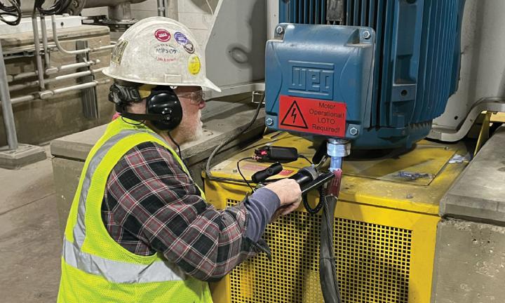 HECO Field Service working on a vertical electric motor