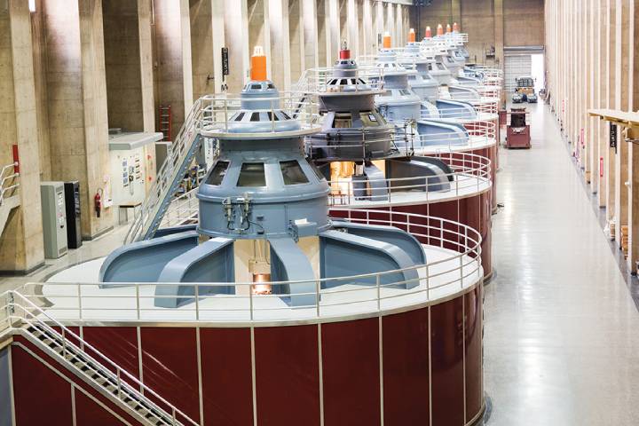 Power generation turbines in a dam.